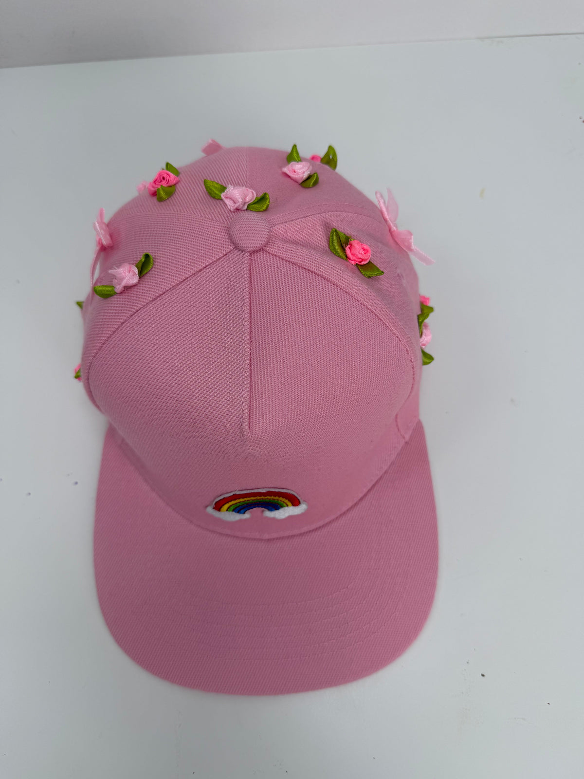 Gorra Rainbow Rosa — Rainbow Factory, vista cenital de los capullos