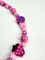 Collar Rueda de color #5 — Rainbow Factory, detalle de la fresa