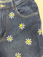 Jean Me quiere no me quiere — Rainbow Factory, detalle de las margaritas